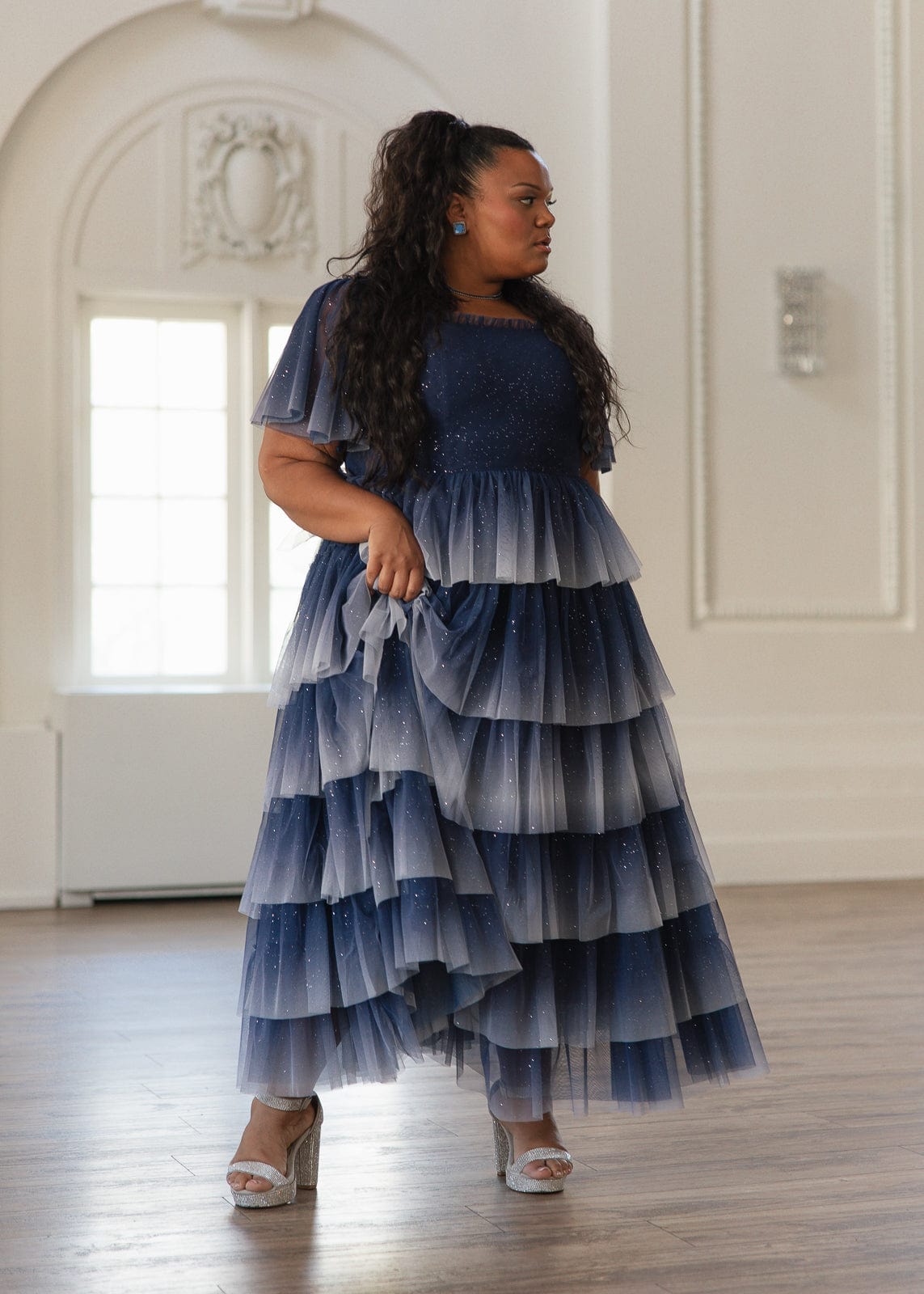 chic size inclusive model wearing JessaKae Clarabelle Dress