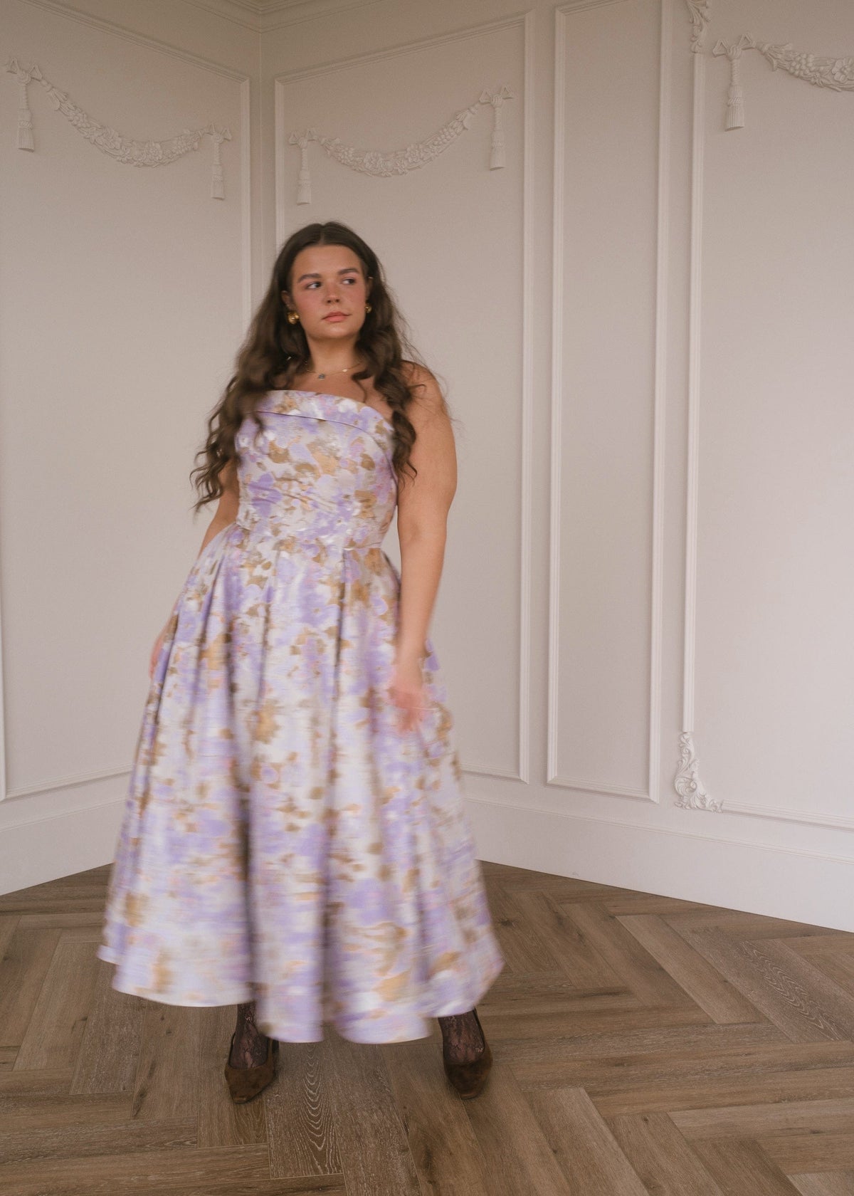 chic size inclusive model wearing JessaKae Anastelle Dress