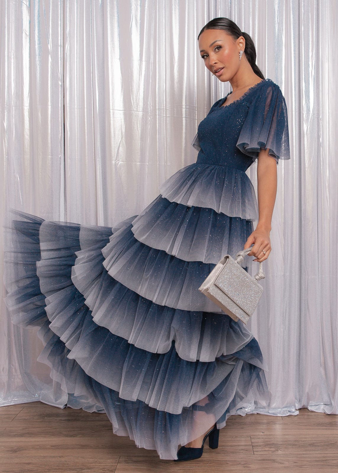 chic size inclusive model wearing JessaKae Clarabelle Dress