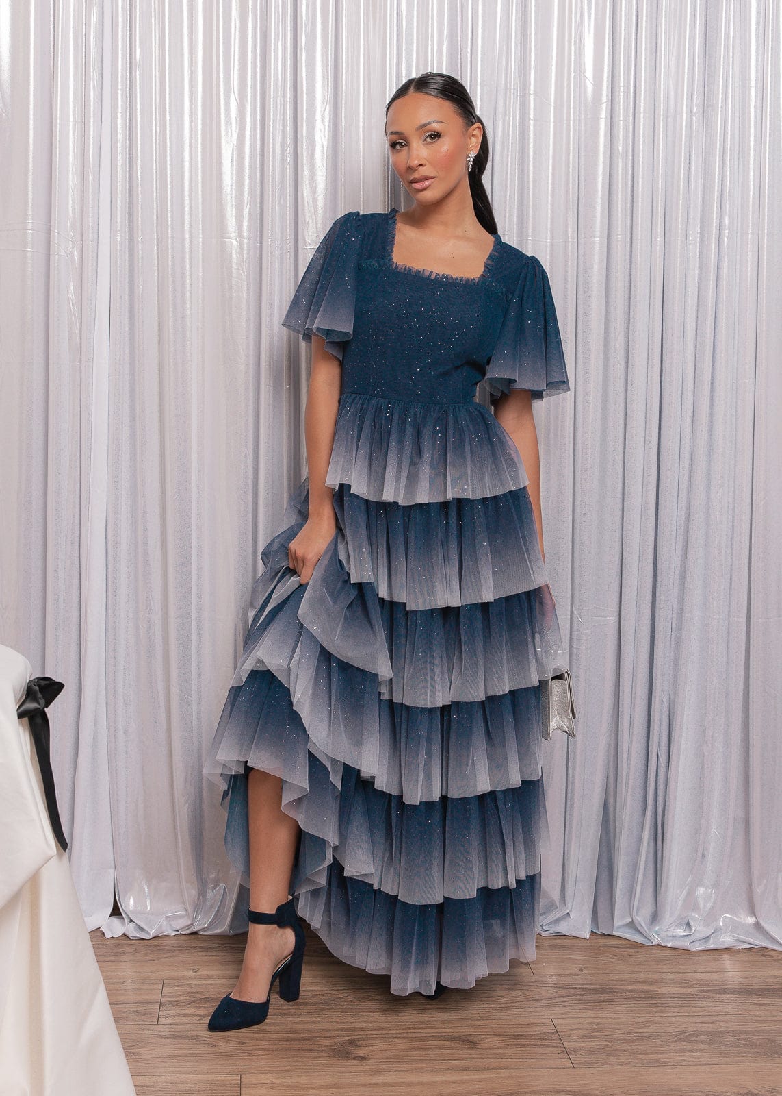 chic size inclusive model wearing JessaKae Clarabelle Dress