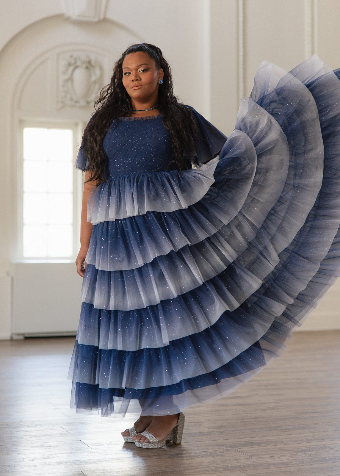 chic size inclusive model wearing JessaKae Clarabelle Dress