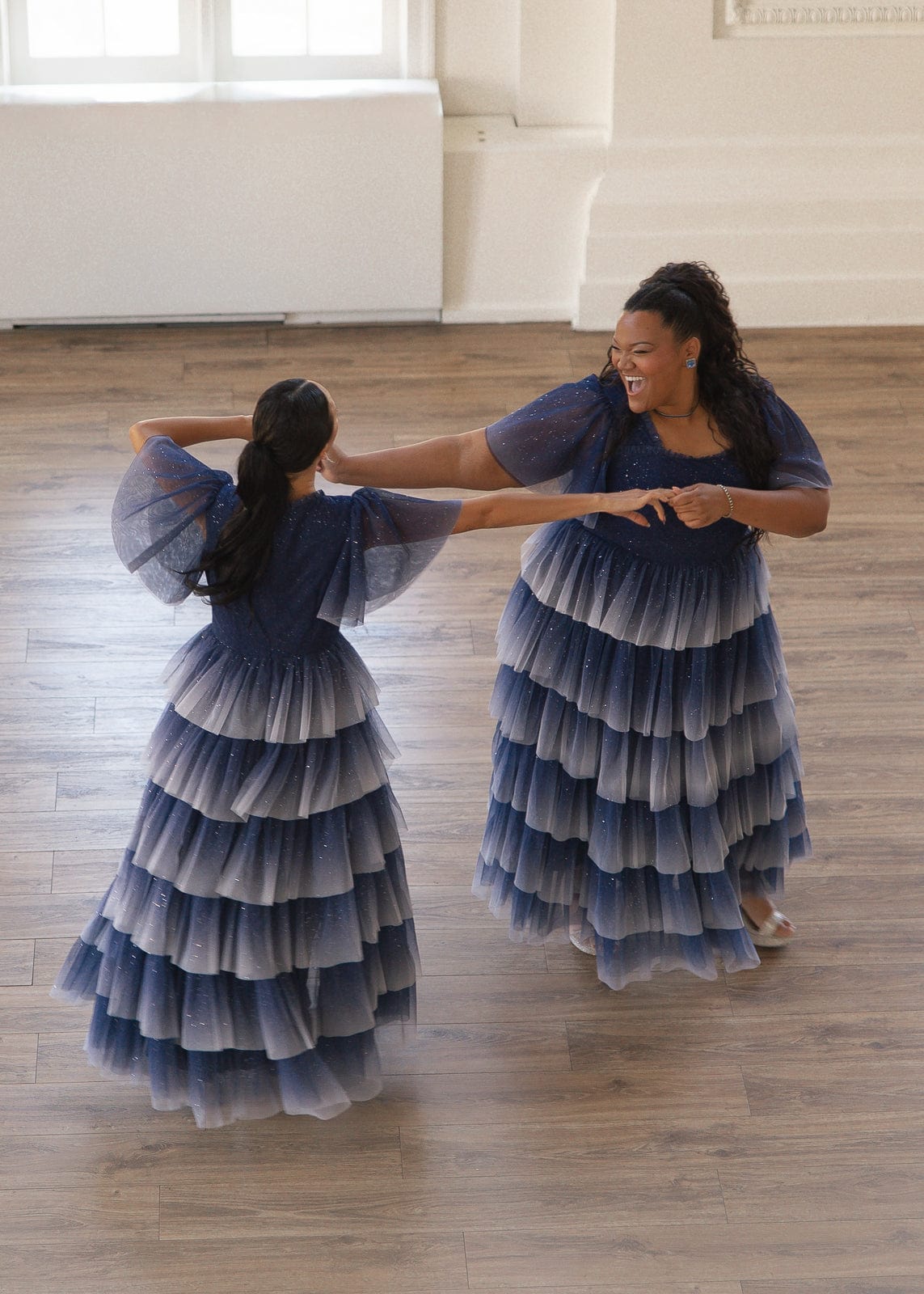 chic size inclusive model wearing JessaKae Clarabelle Dress