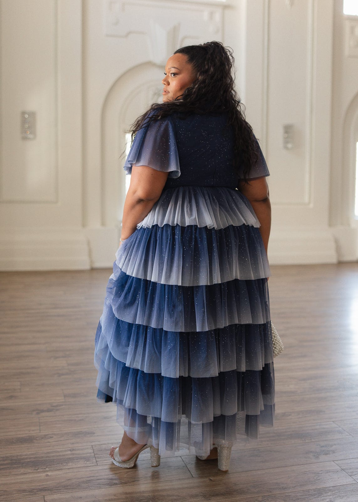 chic size inclusive model wearing JessaKae Clarabelle Dress
