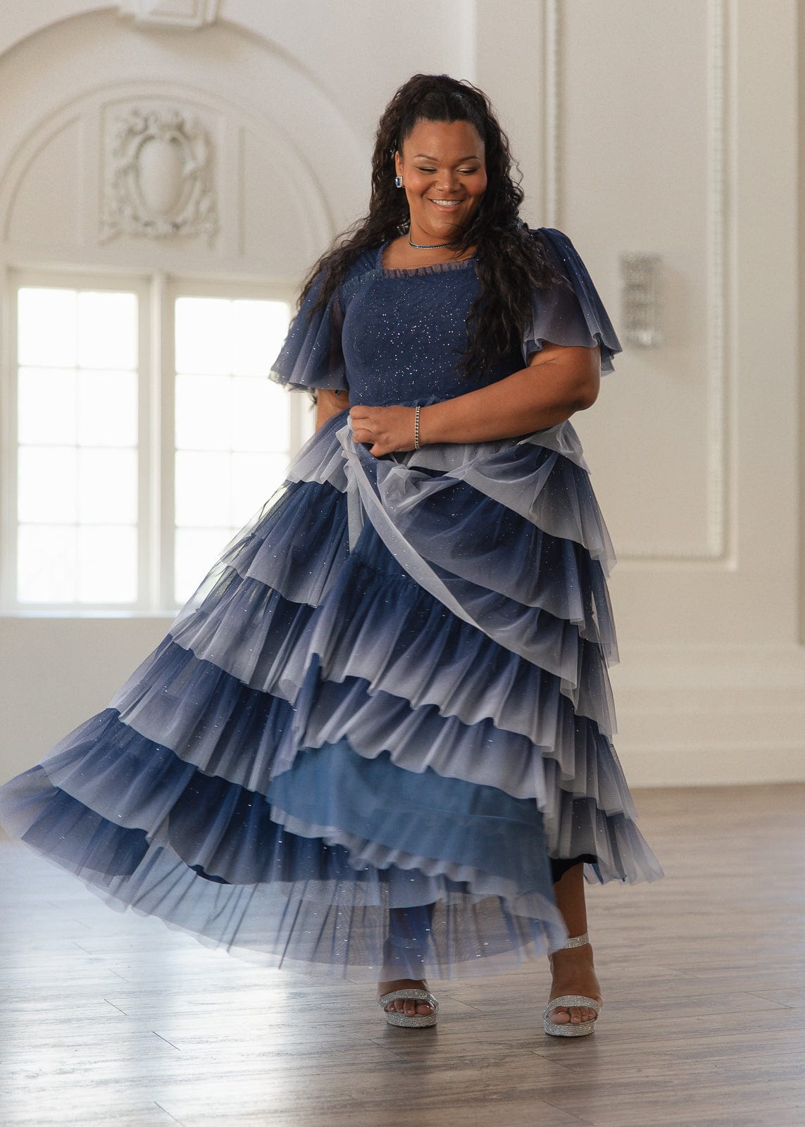 chic size inclusive model wearing JessaKae Clarabelle Dress