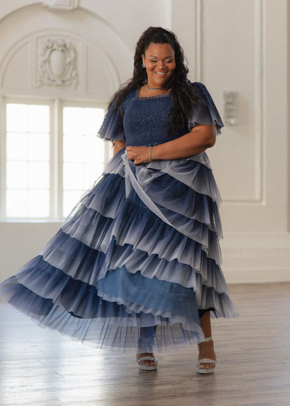 chic size inclusive model wearing JessaKae Clarabelle Dress