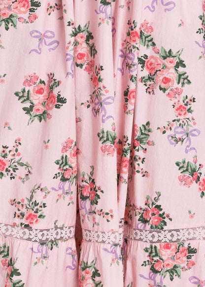 chic size inclusive model wearing JessaKae Juliette Floral Bow Maxi Dress - Pink