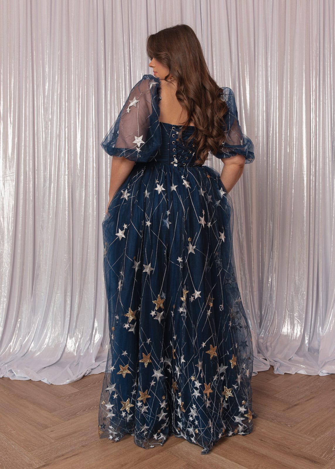 chic size inclusive model wearing JessaKae Starla Dress